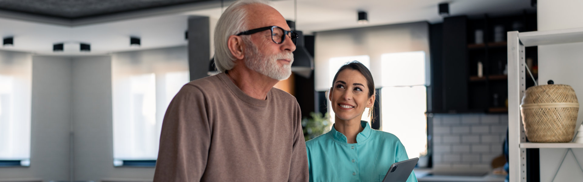 caregiver woman with senior man